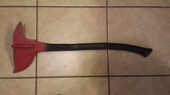 Post Korean War U.S. Air Force crash axe; the radiused blade designed to pull easily out of cuts in aluminum air frames.